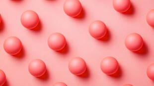 粉色圆球排列创意背景图