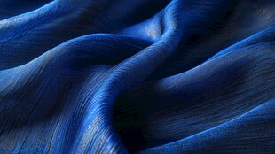 蓝色丝绸的优雅褶皱纹理