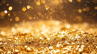 金色闪耀颗粒背景图