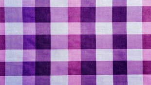 紫粉格纹布料纹理特写