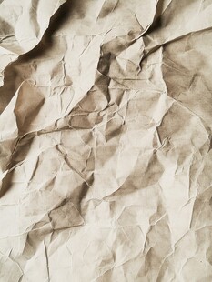 褶皱旧纸张纹理特写