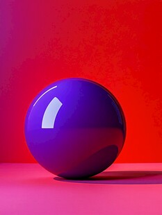 紫色球体于红背景前