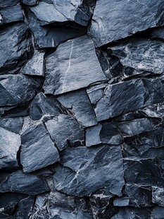 黑色碎石墙面纹理特写