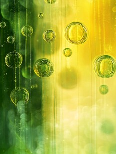 梦幻黄绿背景下的透明气泡