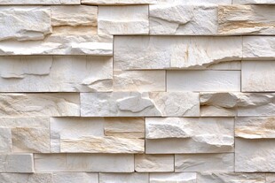 米色石砌墙面纹理特写