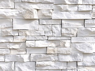 白色石砌墙面纹理特写