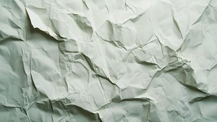 皱巴巴的浅绿色纸张纹理