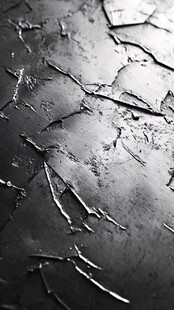 粗糙开裂的黑色纹理表面