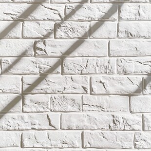 白色砖墙光影纹理背景图