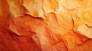 橘色褶皱纸张纹理背景