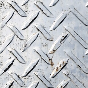 白色花纹钢板纹理特写
