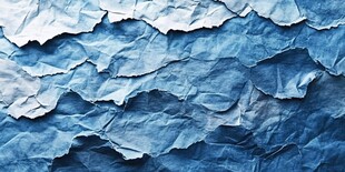 蓝色褶皱纸张纹理特写