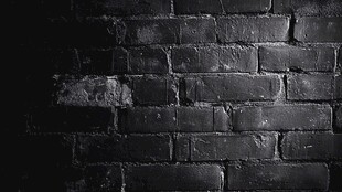 黑色砖墙纹理背景图