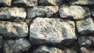 古老石砌墙面纹理特写