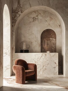 大理石空间中的绒面单人椅
