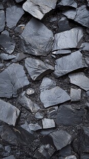 黑色碎石墙面纹理特写