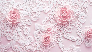 粉色蕾丝上的立体纸艺玫瑰