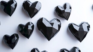 黑色心形宝石散落在白色背景