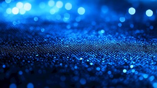 梦幻蓝色光斑闪烁织物背景