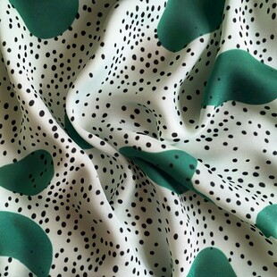 绿白波点花纹柔软布料