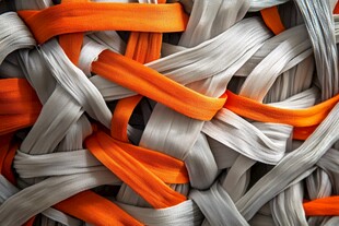 橙白交织的彩色丝带纹理