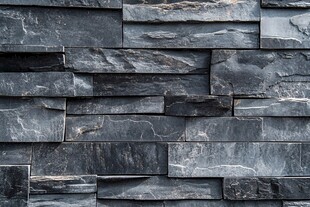 灰黑色石砌墙面纹理特写