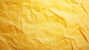 黄色褶皱纸张纹理背景