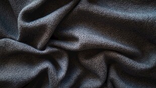 深灰色柔软褶皱布料纹理