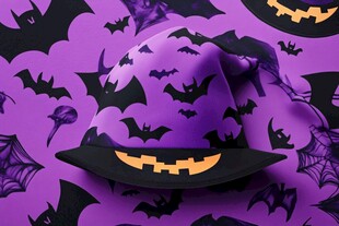 紫色万圣节女巫帽蝙蝠背景