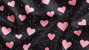 粉色爱心点缀黑色背景图
