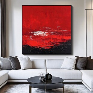 客厅中的抽象红色艺术挂画
