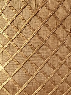 金色菱格纹理织物表面