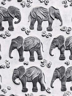 大象浮雕图案纹理背景
