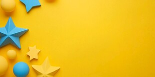 黄色背景上的多彩星星圆球