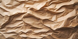 皱巴巴的牛皮纸纹理特写