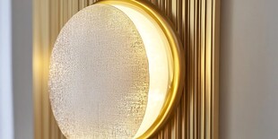 圆形壁灯营造温馨家居氛围