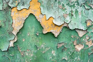 剥落的绿黄旧漆墙面纹理