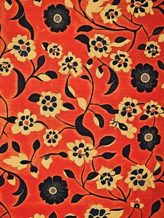 橙底黑黄花卉图案纹理