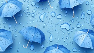 蓝色雨伞上的晶莹水滴