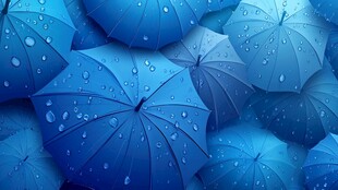 蓝色雨滴雨伞密集景象