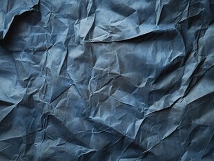 蓝色褶皱纸张纹理背景