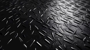 黑色菱形花纹金属板表面