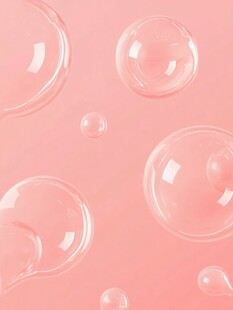 梦幻粉色背景上的透明气泡