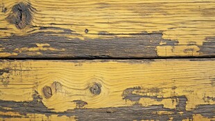老旧斑驳的黄色木板纹理