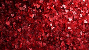 红色爱心碎屑浪漫背景图