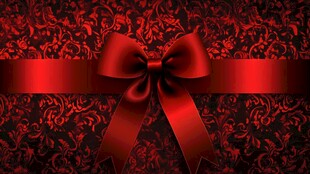 红丝带蝴蝶结花纹背景图