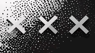 黑白波点背景上的立体叉