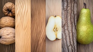 木纹背景上的梨子与核桃