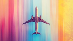 彩色背景上的翱翔飞机