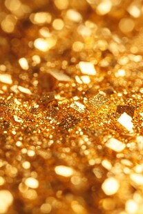 金色璀璨闪光颗粒背景图